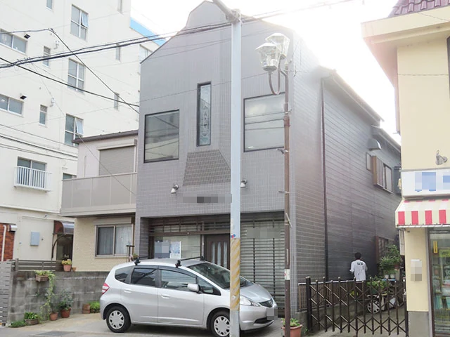 松戸市の直貼り外壁の欠損・目地を補修の施工後実写真